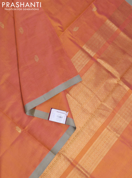 Kanchipuram silk cotton saree orange and beige with zari woven buttas and piping border