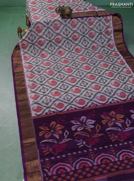 Ikat silk cotton saree off white and purple with allover ikat weaves and zari woven border