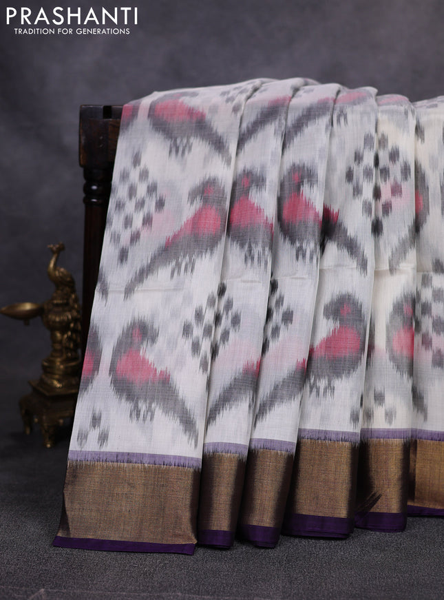 Ikat silk cotton saree off white and violet with allover ikat weaves and zari woven border