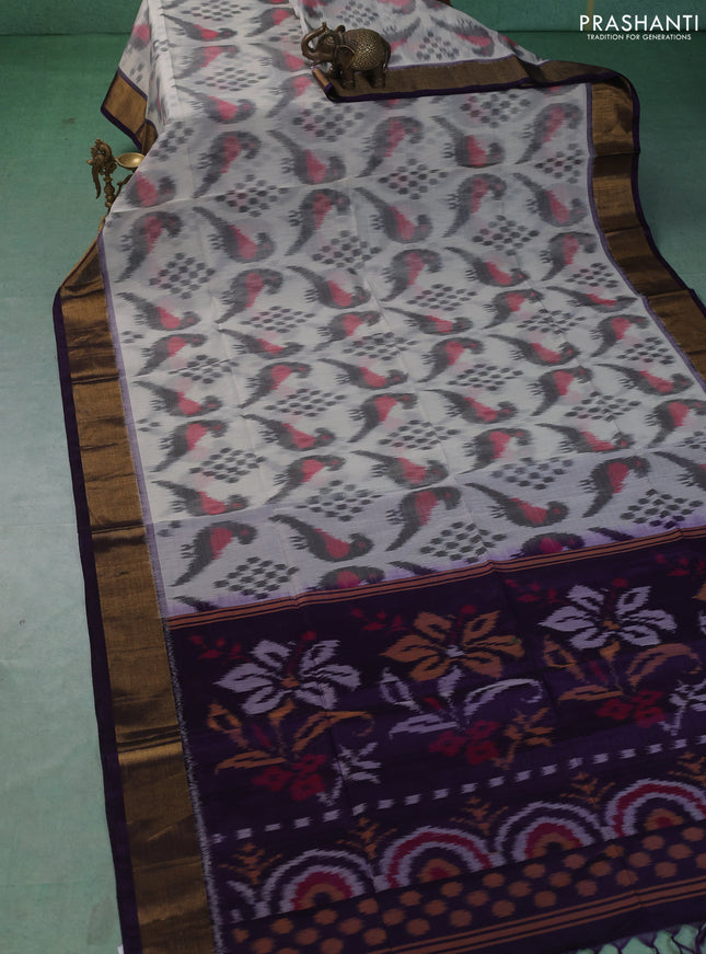 Ikat silk cotton saree off white and violet with allover ikat weaves and zari woven border