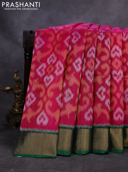 Ikat silk cotton saree pink and green with allover ikat weaves and zari woven border