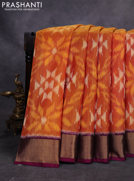 Ikat silk cotton saree orange and dark magenta pink with allover ikat weaves and zari woven border