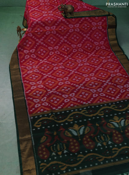 Ikat silk cotton saree pink and green with allover ikat weaves and zari woven border