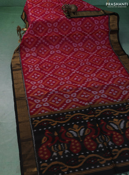 Ikat silk cotton saree dark pink and black with allover ikat weaves and zari woven border
