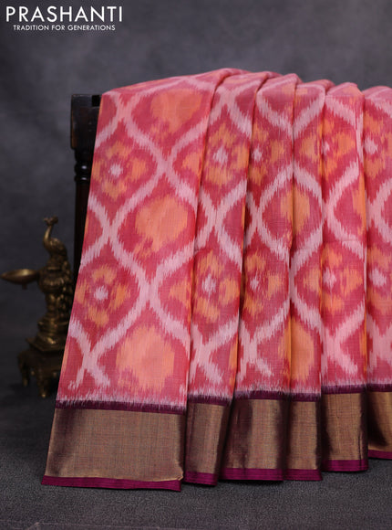 Ikat silk cotton saree peach pink and dark magenta with allover ikat weaves and zari woven border