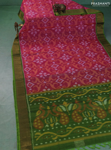 Ikat silk cotton saree pink and green with allover ikat weaves and zari woven border