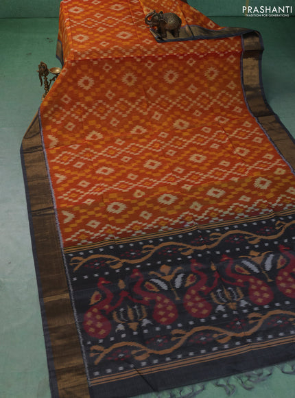 Ikat silk cotton saree sunset orange and grey with allover ikat weaves and zari woven border