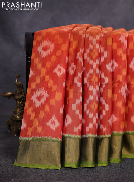 Ikat silk cotton saree orange and mehendi green with allover ikat weaves and zari woven border