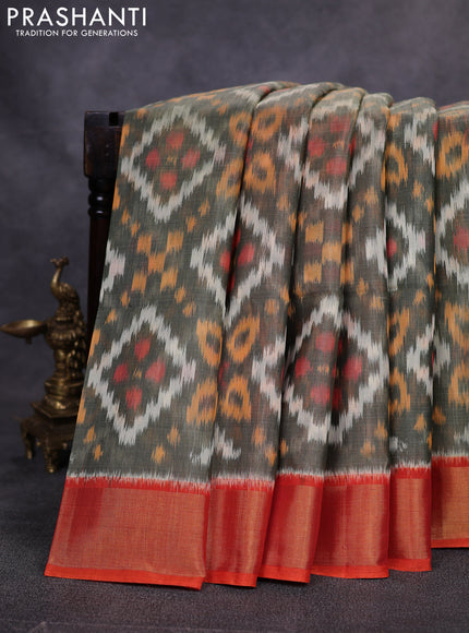 Ikat silk cotton saree grey and orange with allover ikat weaves and zari woven border