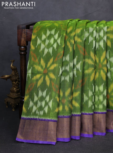 Ikat silk cotton saree green and blue with allover ikat weaves and zari woven border