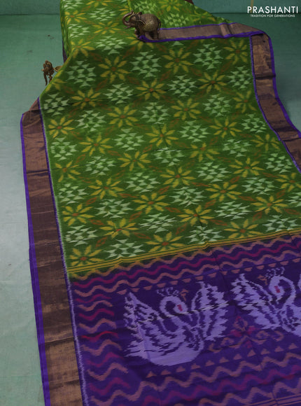 Ikat silk cotton saree green and blue with allover ikat weaves and zari woven border