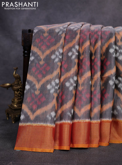 Ikat silk cotton saree grey and sunset orange with allover ikat weaves and zari woven border