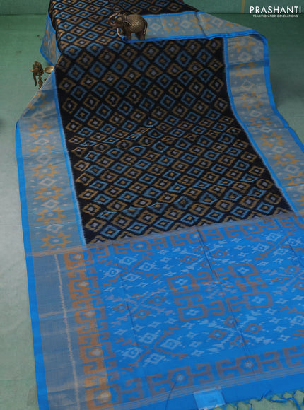 Ikat silk cotton saree black and cs blue with allover ikat weaves and long zari woven border