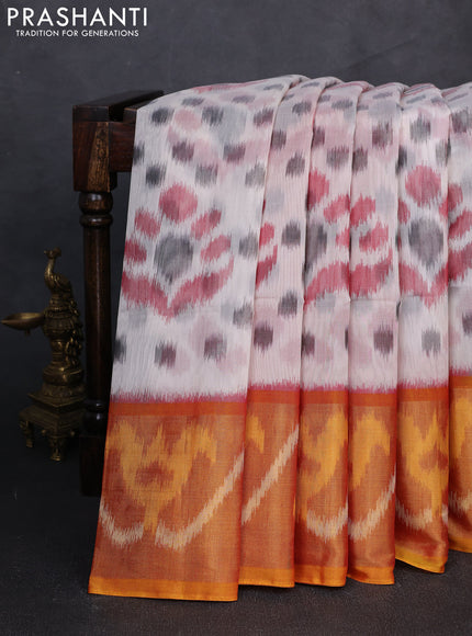 Ikat silk cotton saree off white and sunset orange with allover ikat weaves and long zari woven border