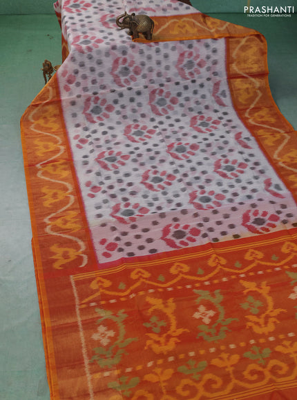 Ikat silk cotton saree off white and sunset orange with allover ikat weaves and long zari woven border