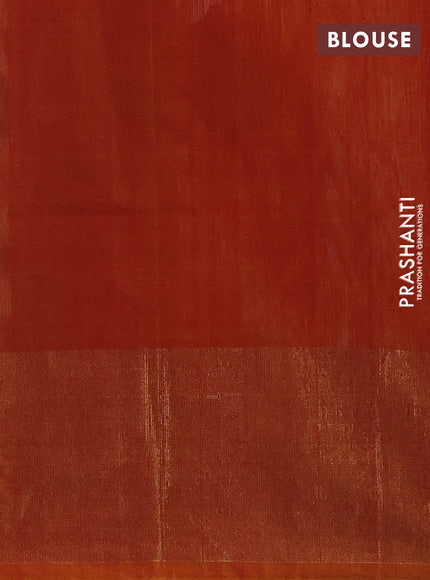 Ikat silk cotton saree off white and sunset orange with allover ikat weaves and long zari woven border