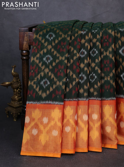 Ikat silk cotton saree dark green and sunset orange with allover ikat weaves and long zari woven border