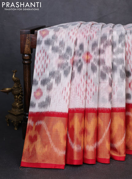 Ikat silk cotton saree off white and red with allover ikat weaves and long zari woven border