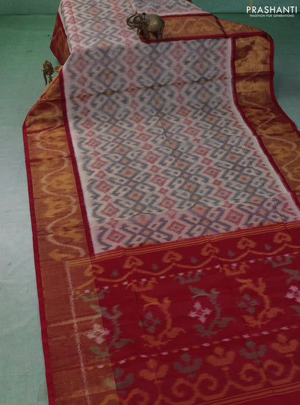 Ikat silk cotton saree cream and red with allover ikat weaves and long zari woven border
