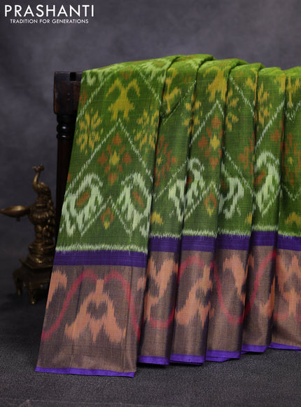Ikat silk cotton saree green and lavender with allover ikat weaves and long zari woven border