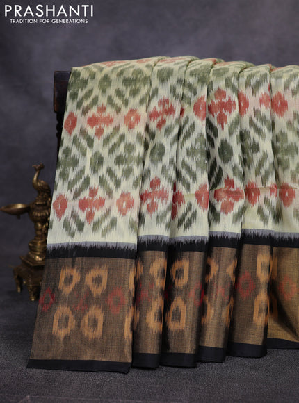 Ikat silk cotton saree pista green and black with allover ikat weaves and long zari woven border