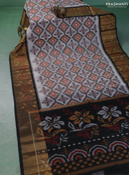 Ikat silk cotton saree grey and black with allover ikat weaves and long zari woven border