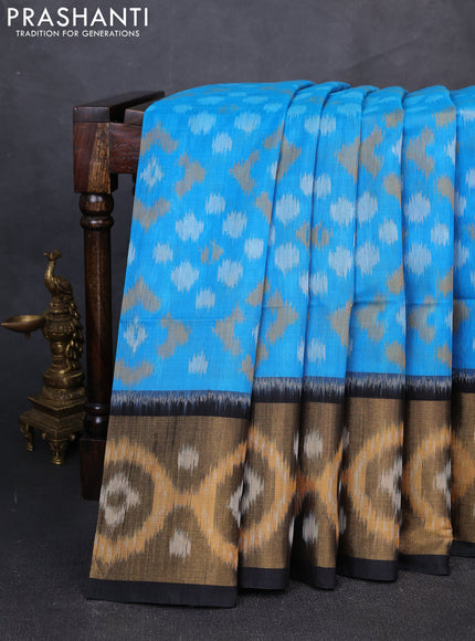Ikat silk cotton saree cs blue and black with allover ikat weaves and long zari woven border