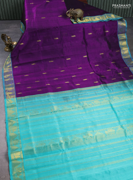 Silk cotton saree purple and teal green with zari woven buttas and zari woven border