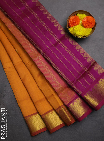 Silk cotton saree mustard yellow and purple with zari woven buttas and zari woven border