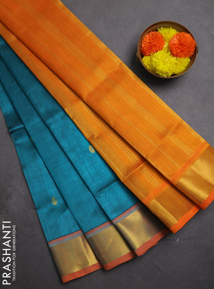 Silk cotton saree peacock green and orange with zari woven buttas and zari woven border