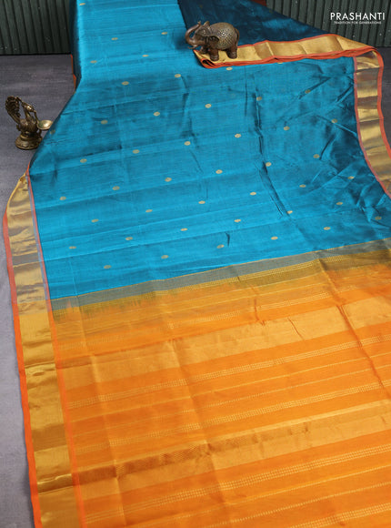 Silk cotton saree peacock green and orange with zari woven buttas and zari woven border