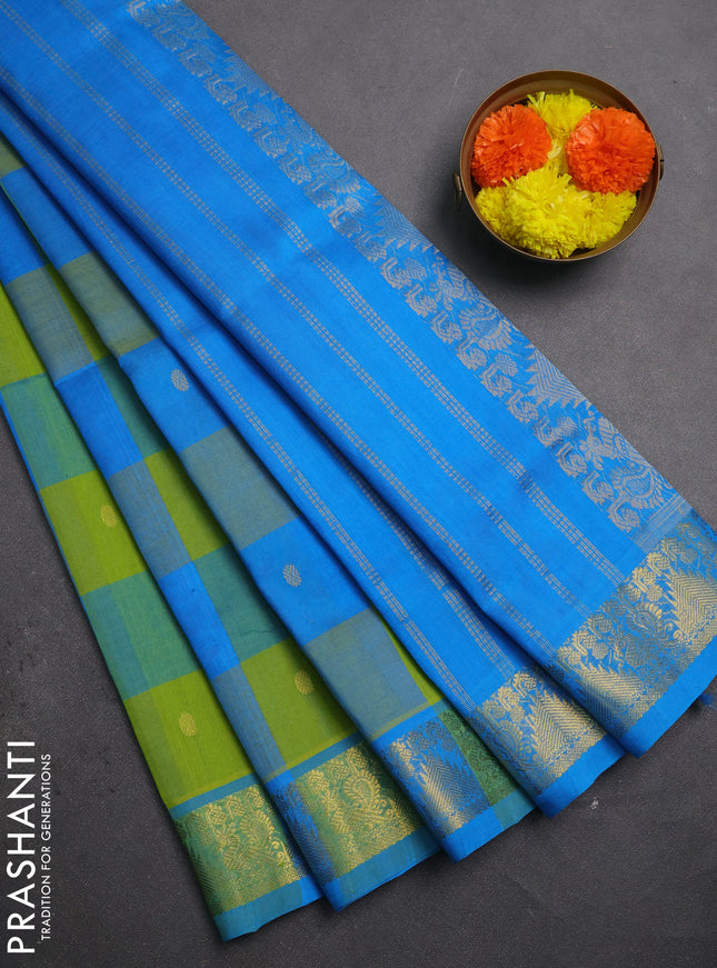 Silk cotton saree light green and cs blue with allover paalum pazhamum checks & buttas and zari woven border