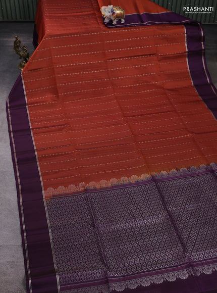 Pure soft silk saree rust shade and deep purple with allover silver zari weaves and rettapet zari woven border