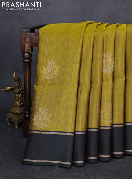Pure soft silk saree mehendi green and green with allover zari weaves and rettapet zari woven border