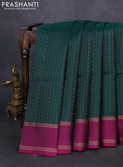 Pure soft silk saree green and magenta pink with allover zari weaves and rettapet zari woven border