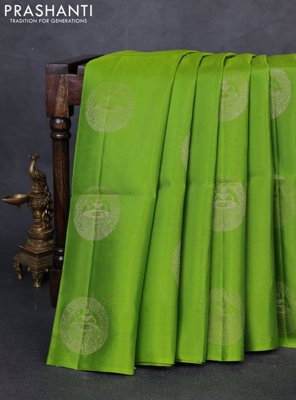 Pure soft silk saree light green and purple with zari woven buttas in borderless style