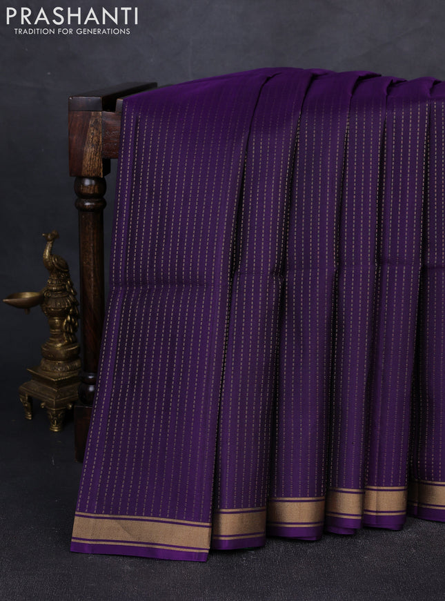 Pure soft silk saree violet and green with allover zari weaves and zari woven border