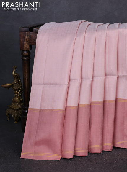 Pure soft silk saree mild peach and pastel brown with allover zari weaves and rettapet zari woven border