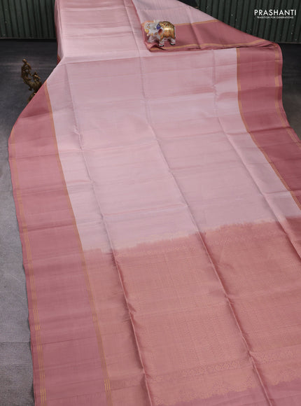 Pure soft silk saree mild peach and pastel brown with allover zari weaves and rettapet zari woven border