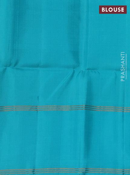 Pure soft silk saree dual shade of green and teal blue with allover zari woven buttas and rettapet zari woven border
