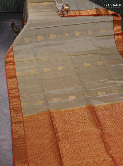 Pure soft silk saree beige and orange with zari woven buttas and zari woven border
