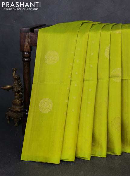 Pure soft silk saree fluorescent green with zari woven buttas & jute finished in borderless style