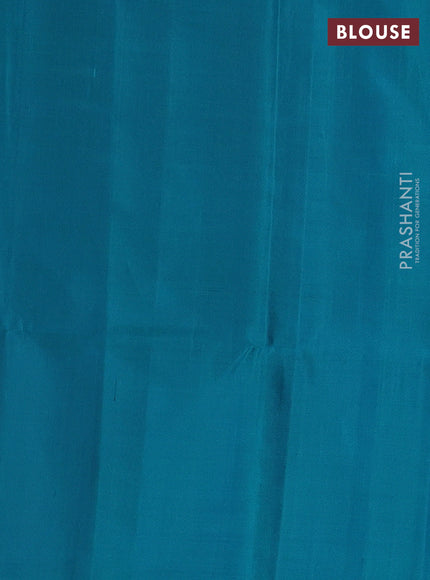 Pure soft silk saree dual shade of teal green with allover silver zari weaves in borderless style