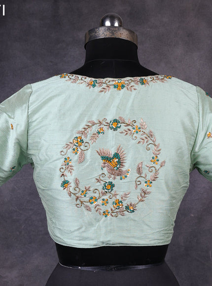Pastel green raw silk readymade kundan work blouse Pastel green and