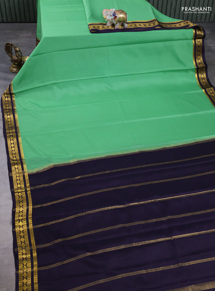 Pure mysore silk saree teal green shade and navy blue with plain body and zari woven border