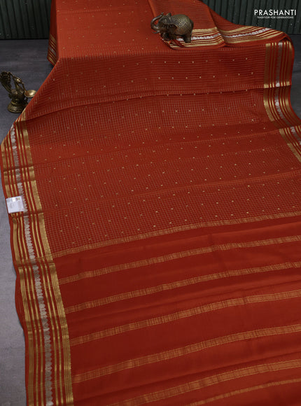 Pure mysore silk saree rust shade with allover small zari checks & buttas and zari woven border