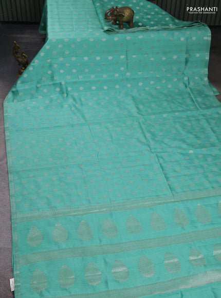 Chiniya silk saree teal green with allover zari woven buttas and zari woven border