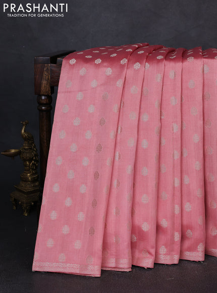 Chiniya silk saree peach shade with allover zari woven buttas and zari woven border