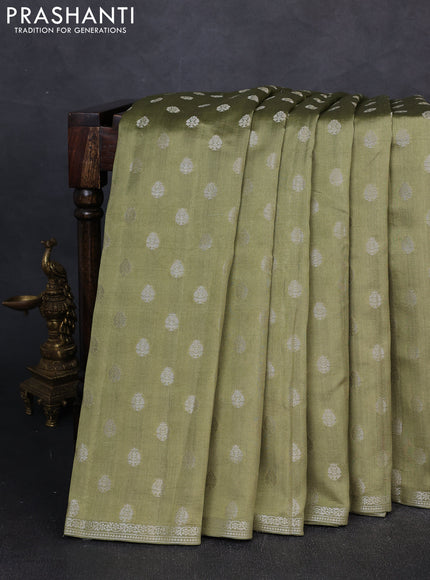 Chiniya silk saree pastel green with allover zari woven buttas and zari woven border