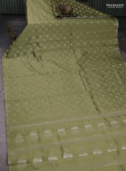 Chiniya silk saree pastel green with allover zari woven buttas and zari woven border